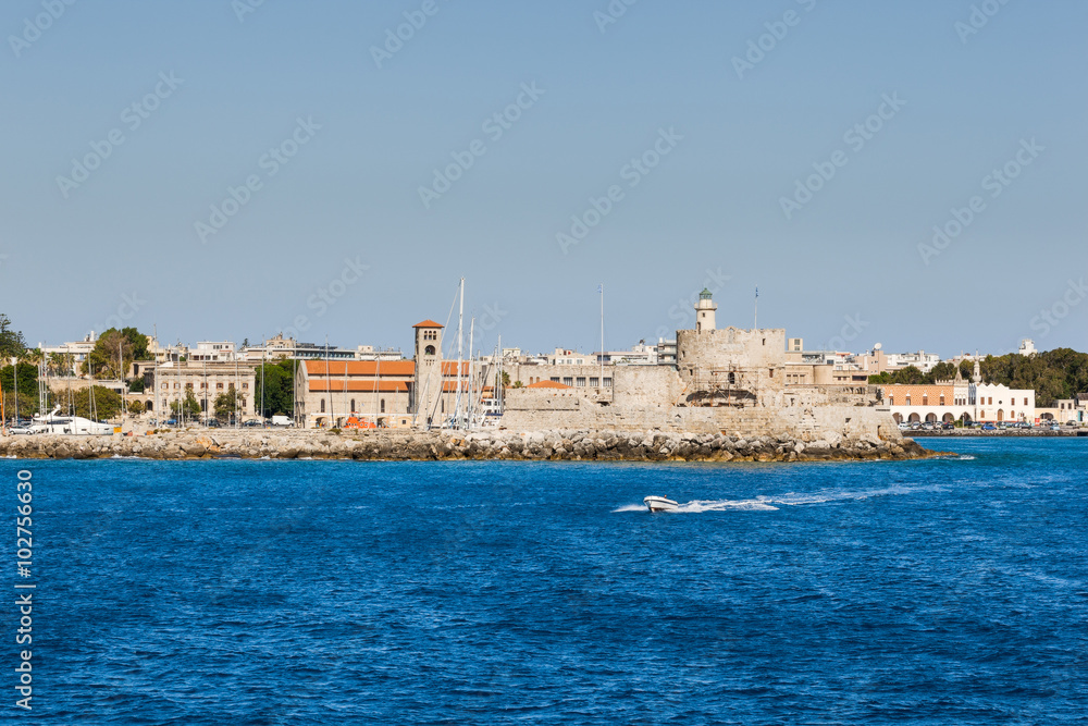 Fortress of St. Nicholas and the waterfront view from the sea. Rhodes Island. Greece