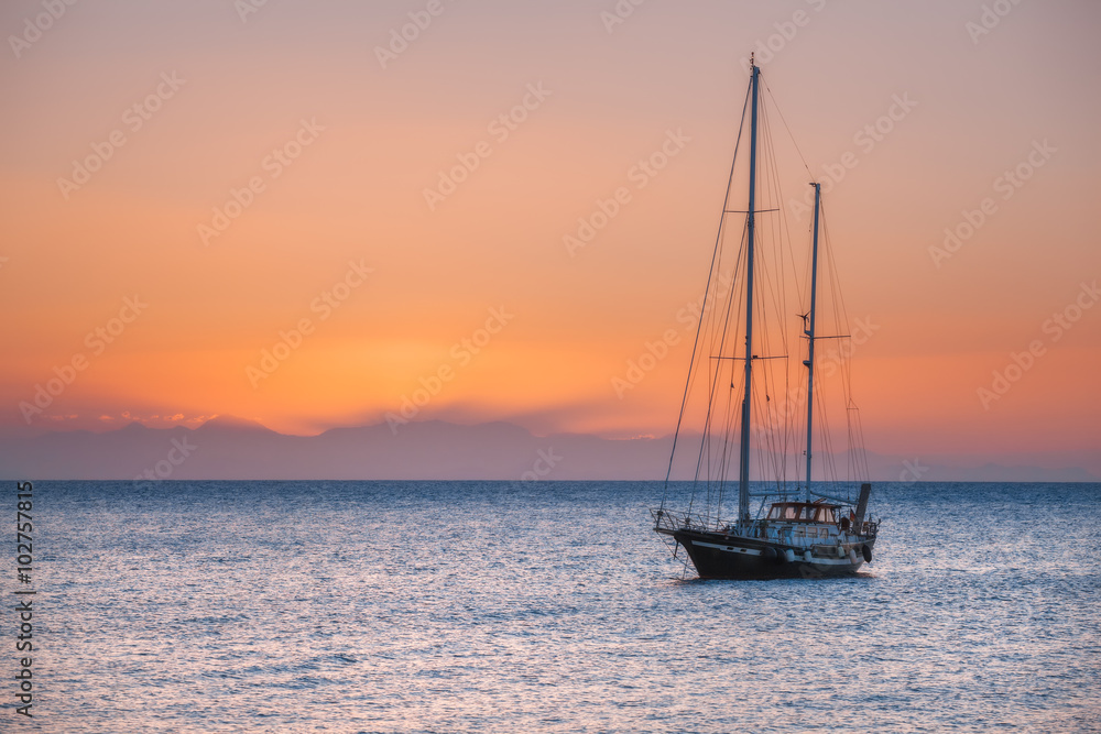 Greece. Rhodes. Yacht at sunrise in the Mediterranean Sea. Rhodes Island. Greece