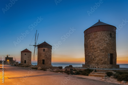 Fotografija Mandraki Harbour windmills on the Island of Rhodes Greece.