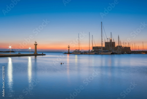 Tableau sur toile Saint Nikolaos fortress and the statue of the Deer at Rhodes island in Greece