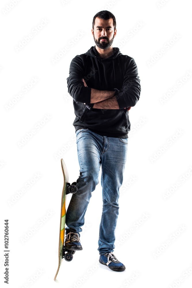 Skater man with his arms crossed Skater man with his arms crossed