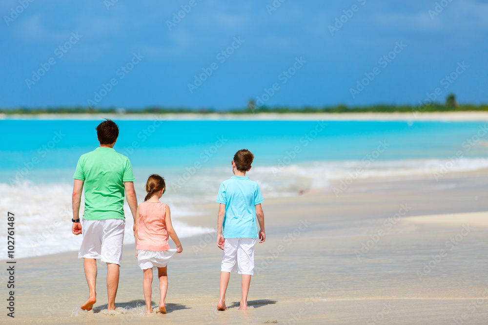 Father with kids at beach Father with kids at beach