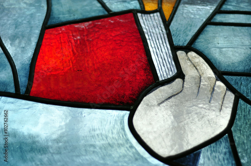 Image book of a multicolored stained glass window with irregular