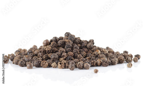 Heap or black pepper isolated on white