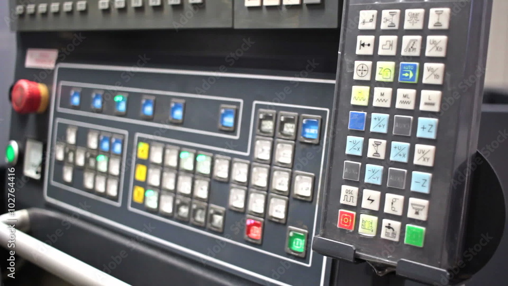 Control panel with lots of buttons for CNC machining centerchanging Control panel with lots of buttons for CNC machining centerchanging