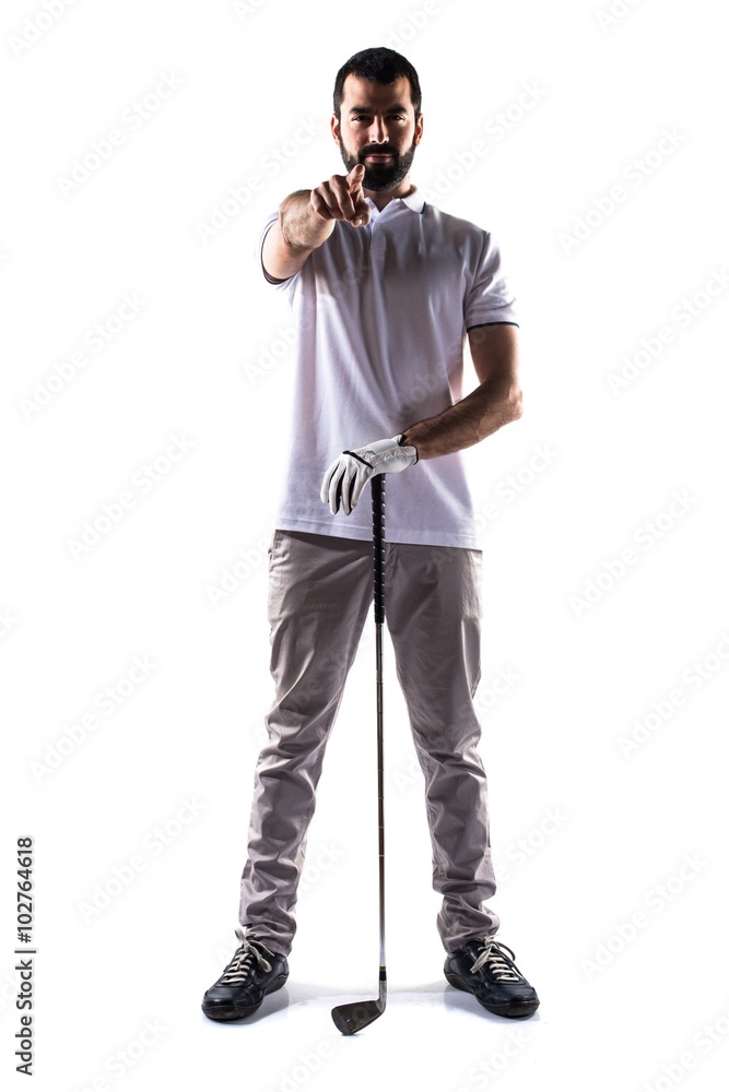 Golfer man pointing to the front Golfer man pointing to the front