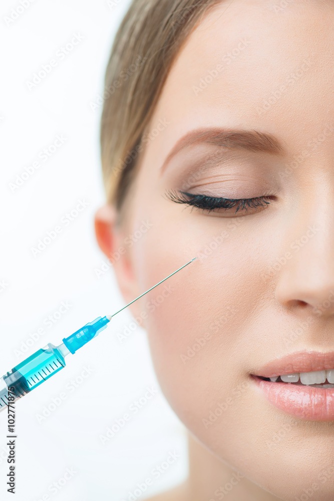 Professional cosmetologist making beauty injections 