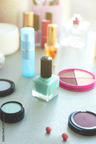 Nail polish with makeup cosmetics on a table