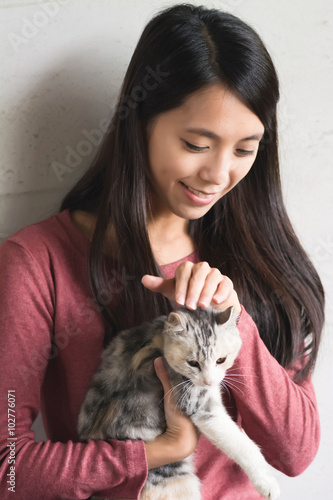  woman play with her kitten