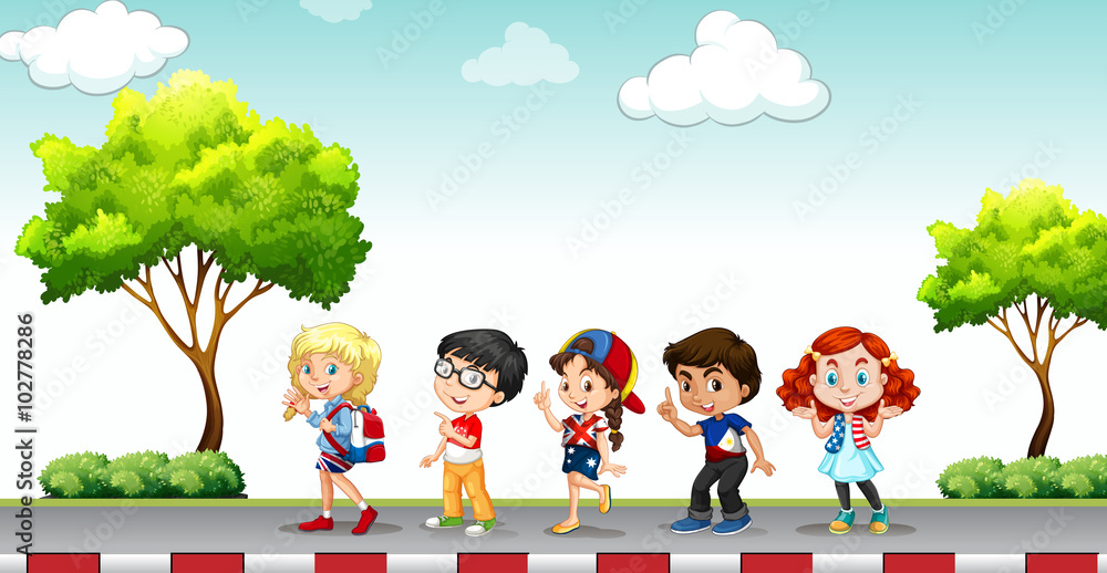 Children standing on the pavement Children standing on the pavement