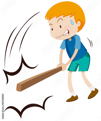 Little boy hitting something with wooden stick