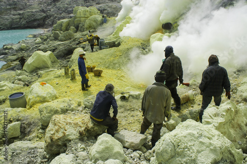 People mining sulfur at kawah ijen. It worth Rp.650 per kilogram.  Photo by Yudhistira Dharma photo