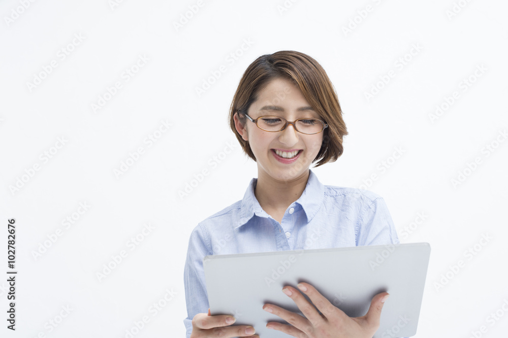 Women are looking at electronic tablet happily Women are looking at electronic tablet happily