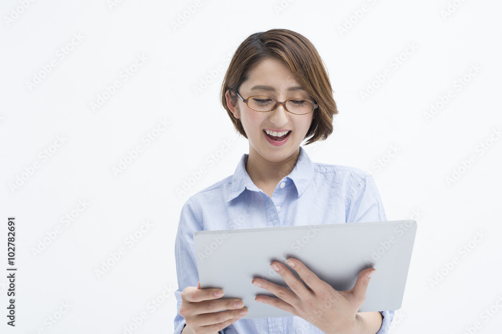 Women are looking at electronic tablet happily Women are looking at electronic tablet happily
