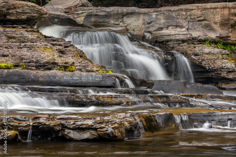 Presque Isle River Waterfall Cascade in Michigan's Porcupine Mountains State Park Presque Isle River Waterfall Cascade in Michigan's Porcupine Mountains State Park