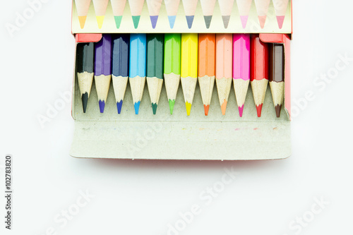 Idea from multicolored pencils isolated on white background.