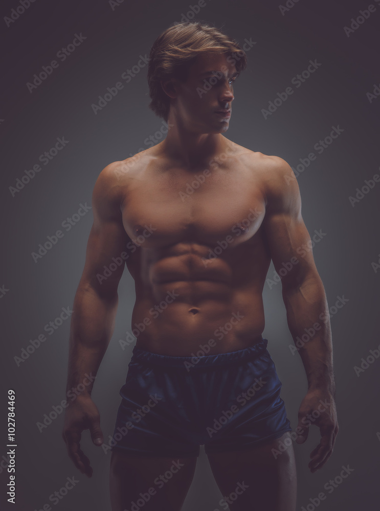 Fototapeta premium Shirtless muscular man in a shorts.