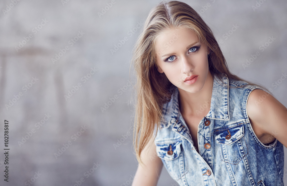 Fototapeta premium Blue eyes woman with long blond hair.