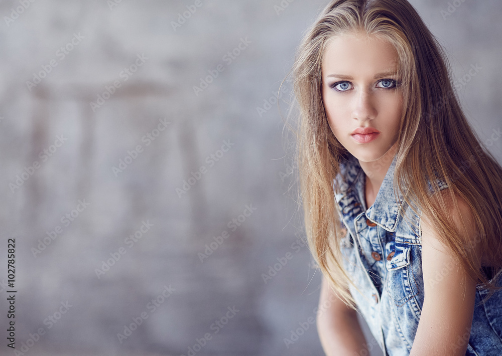 Blue eyes woman with long blond hair. Blue eyes woman with long blond hair.