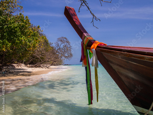 Long tail boat on Koh Rock, Krabi, Thailand photo