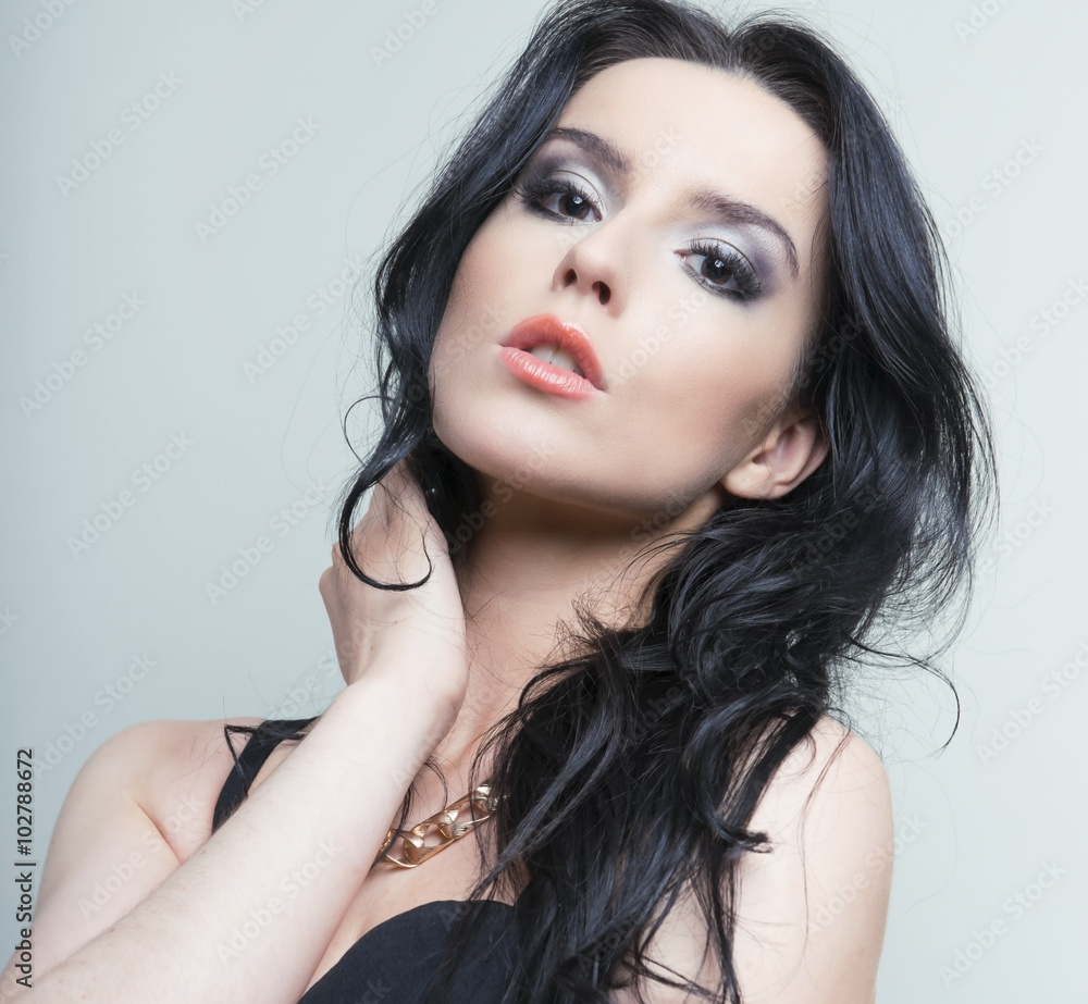 Fototapeta premium beautiful young woman with flawless skin and perfect make-up