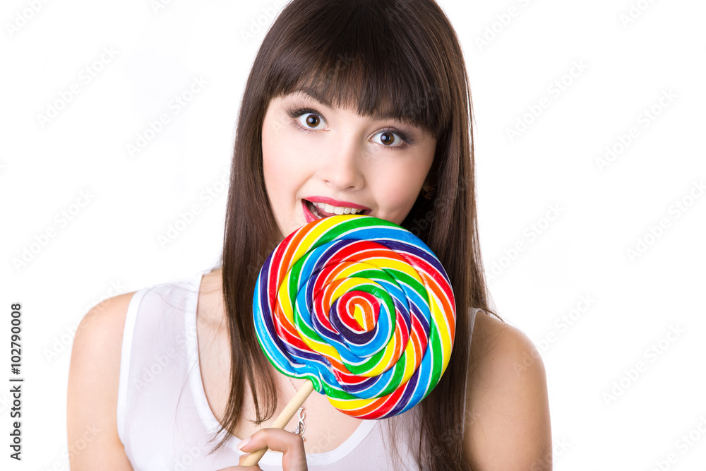 Surprised woman with giant lollipop