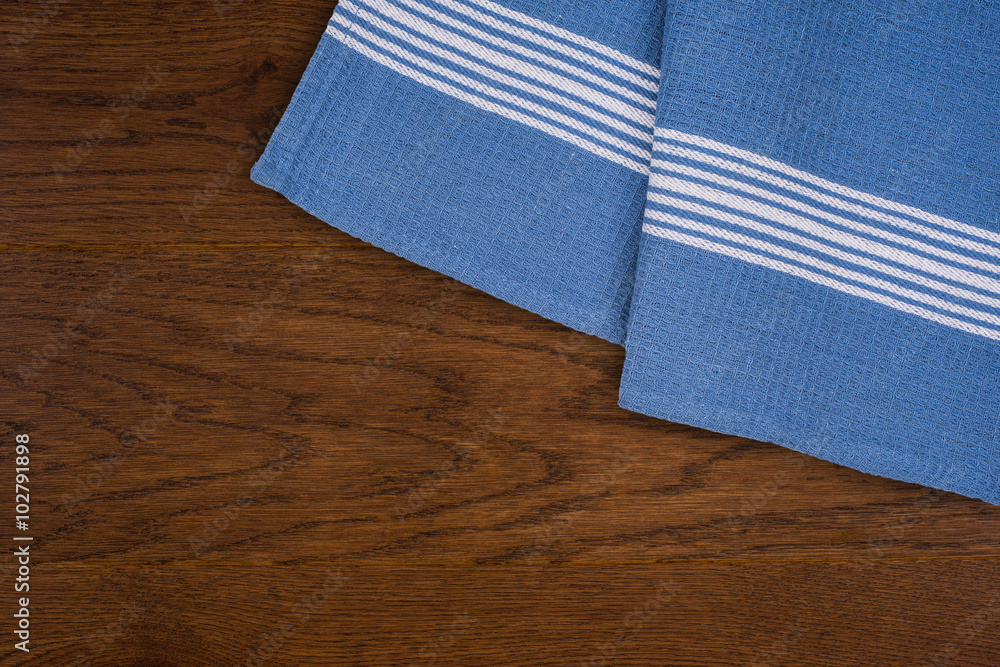 Obraz premium Kitchen towels on wooden background