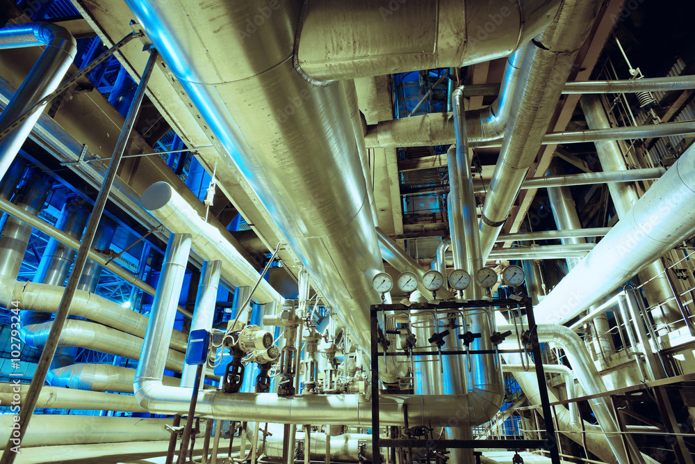 Equipment, cables and piping as found inside of a modern industr Equipment, cables and piping as found inside of a modern industr