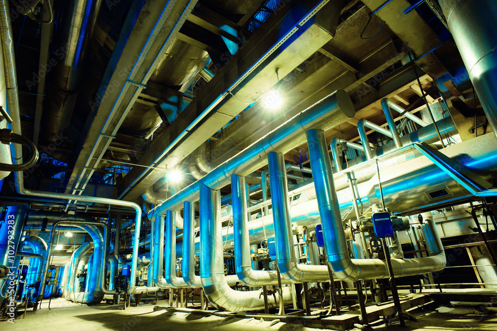 Equipment, cables and piping as found inside of a modern industr Equipment, cables and piping as found inside of a modern industr