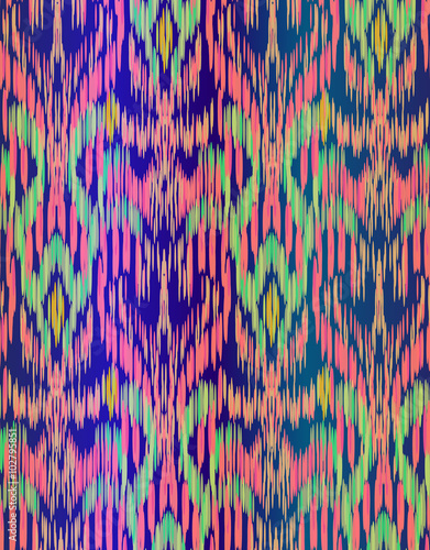 seamless vector ikat pattern. beauitiful ethnic ornament, textile tradition coloring technique. vertical stripes and brush strokes form a geometrical ornament.