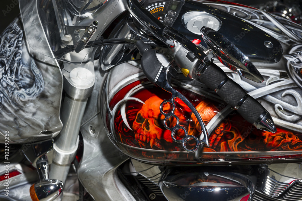 Classic chopper motorcycle with brake lever in the shape of brass