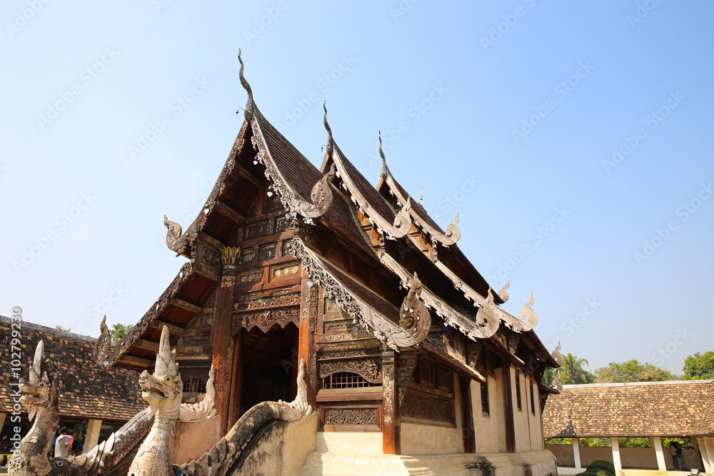 wooden sculpture on ancient buddhism temple gable