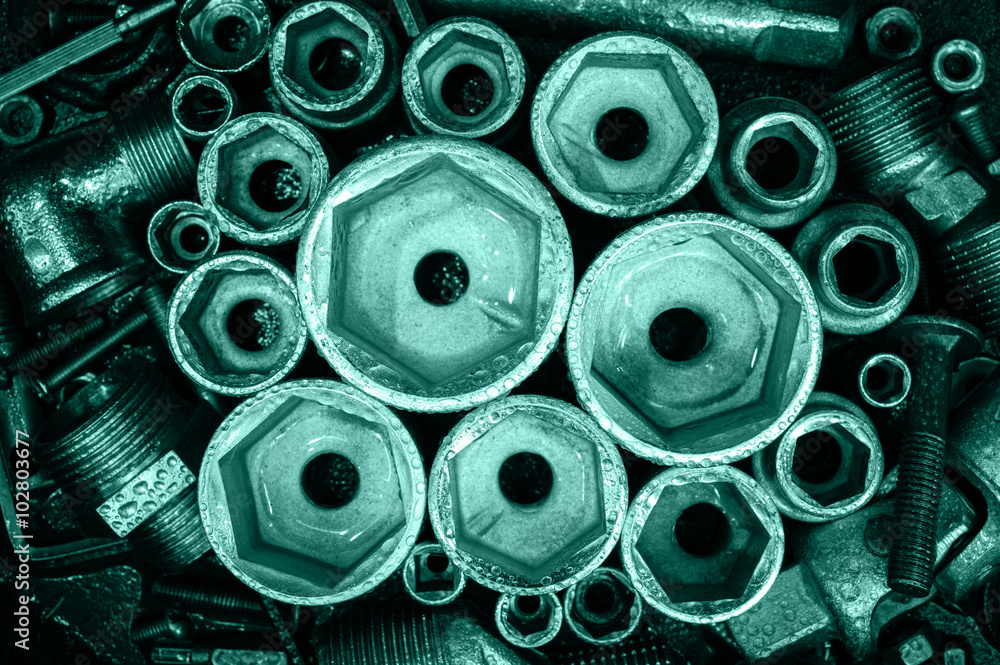 Socket wrench heads and bolts. Socket wrench heads and bolts.