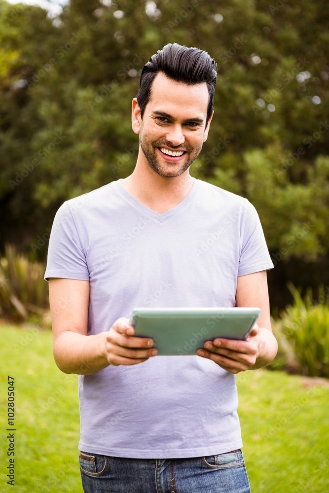 Smiling man using tablet Smiling man using tablet