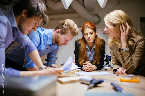 Group of creative designers brainstorming