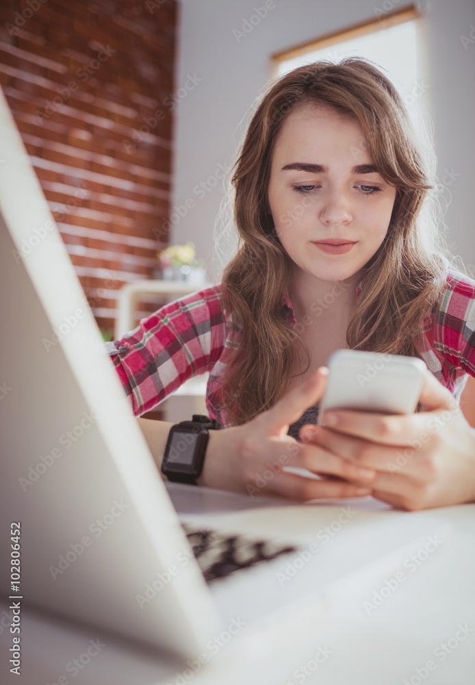 Young hipster businesswoman using her phone Young hipster businesswoman using her phone