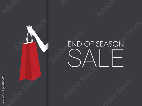 End of season sale banner with hand holding shopping bag and black background.
