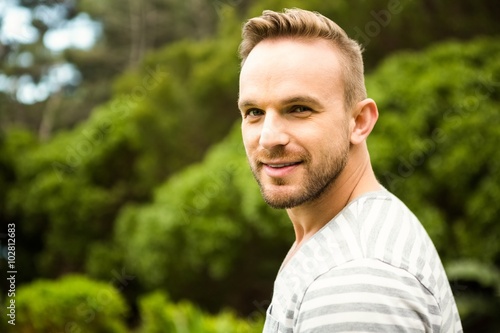 Smiling man posing for camera 