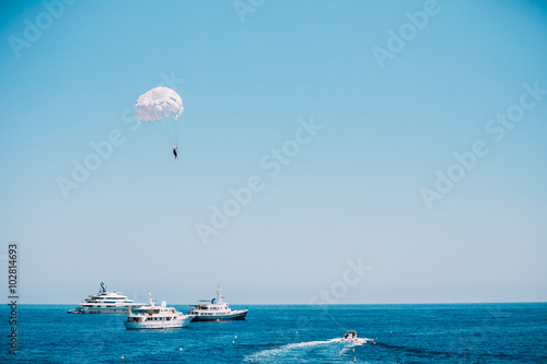 Parasailing in open sea. Water sports