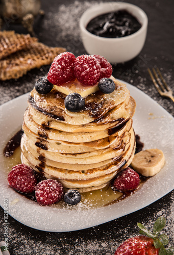 Stack of pancakes with fres...
