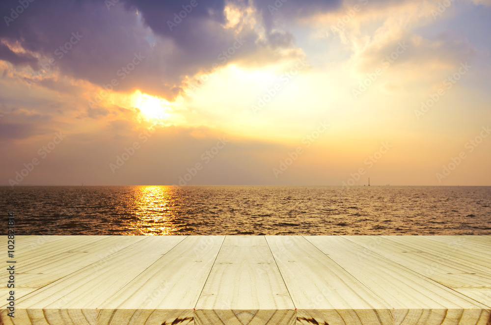 Outdoor Picnic Background with Wooden Table in the Evening Light