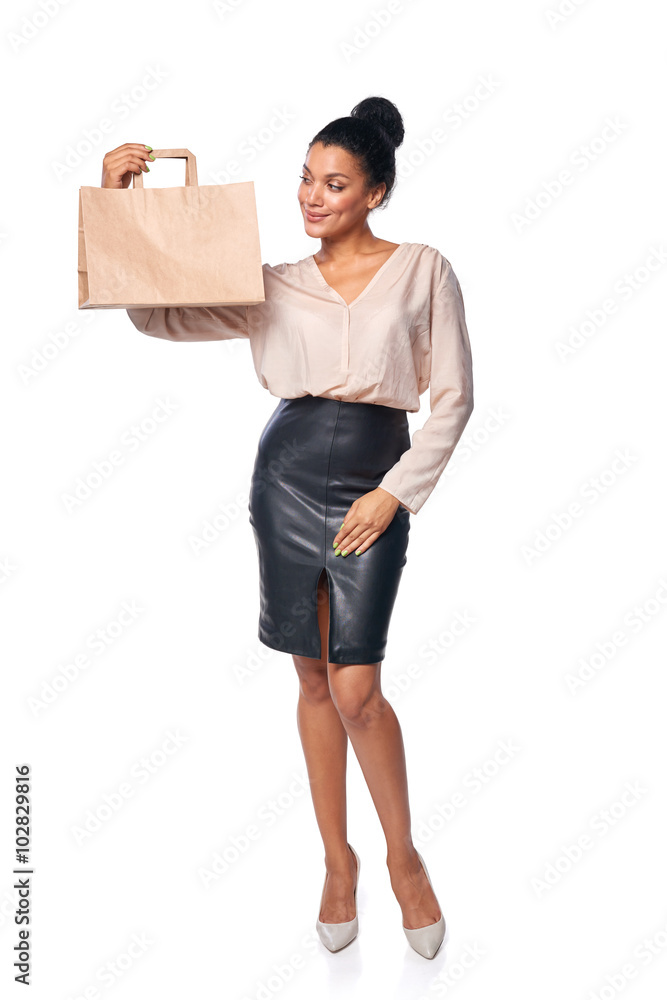 Woman showing shopping bag Woman showing shopping bag
