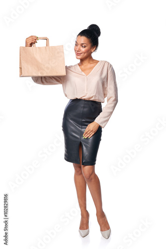 Woman showing shopping bag