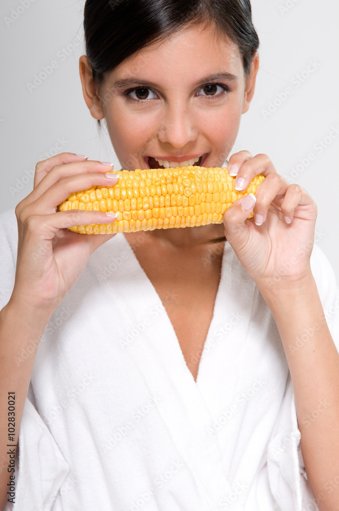 Woman eating corn Woman eating corn