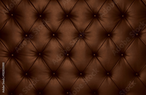 Brown capitone checkered coach leather decoration