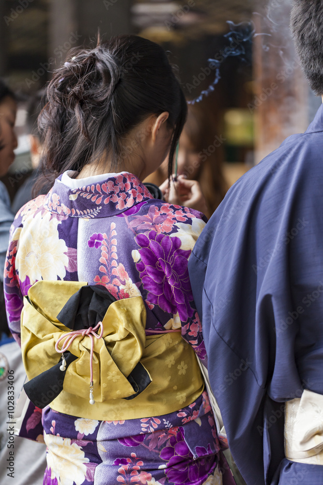 Japanese women wear a traditional dress called Kimono for Sakura Japanese women wear a traditional dress called Kimono for Sakura
