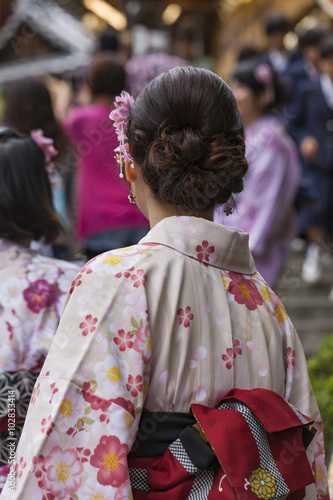 Japanese women wear a traditional dress called Kimono for Sakura