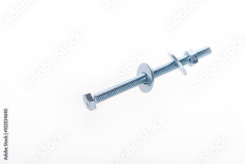 Metal bolt and nut on a white background