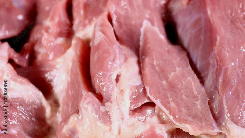 Fresh raw pig meat steak. Macro shot. Fresh raw pig meat steak. Macro shot.