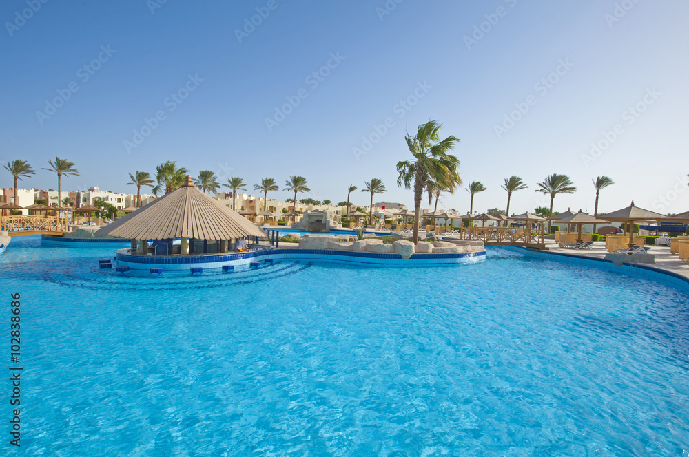 Swimming pool in a luxury tropical hotel resort